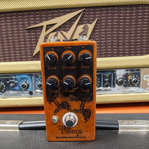 EarthQuaker Talons Overdrive pedal in front of a Peavy amplifier